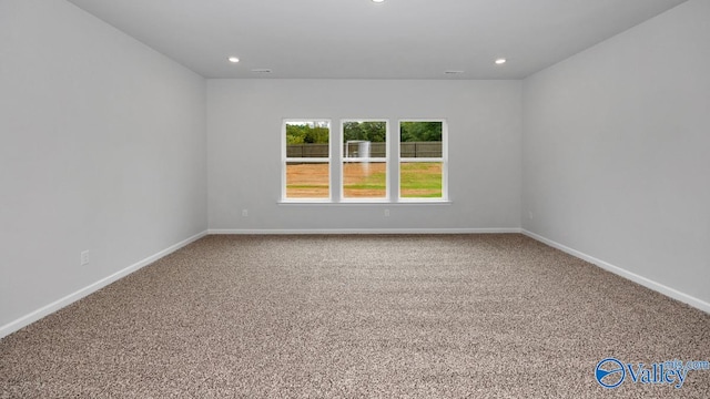 view of carpeted spare room