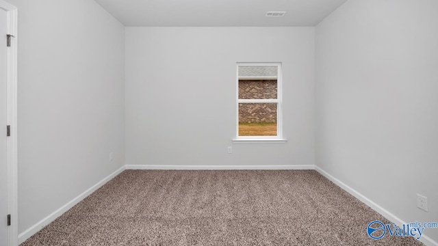 view of carpeted spare room