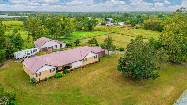 garage with a lawn