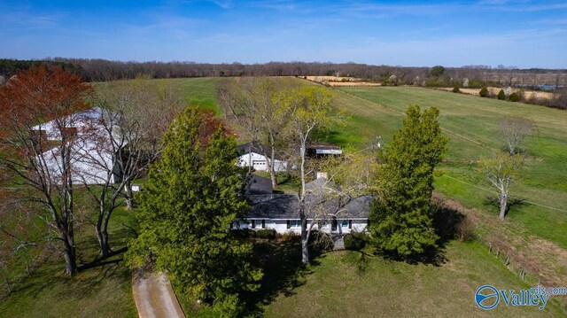 birds eye view of property featuring a rural view