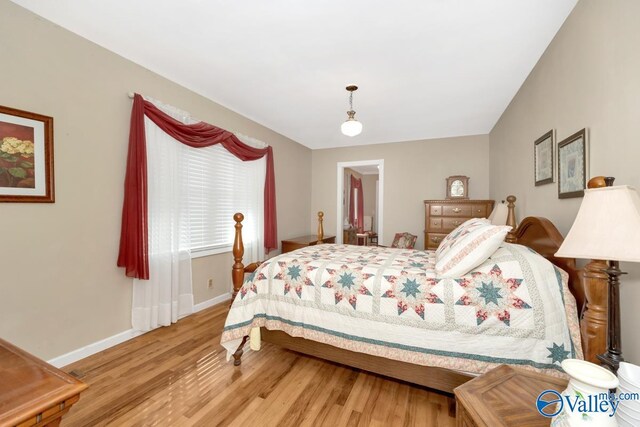 bedroom with light wood-type flooring