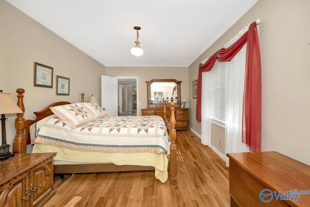 bedroom featuring light wood-type flooring