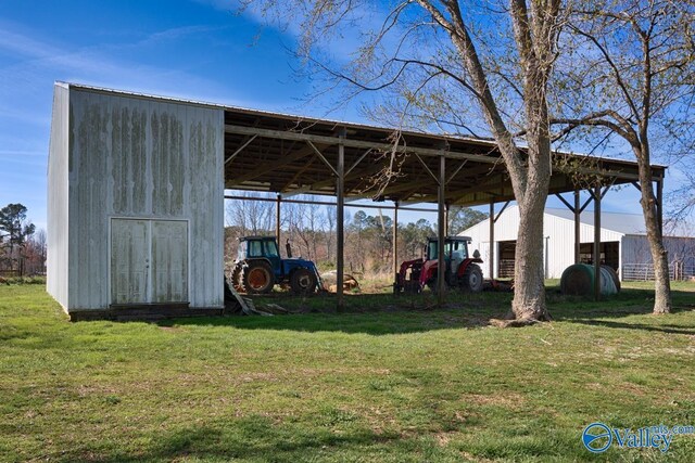 exterior space featuring an outbuilding