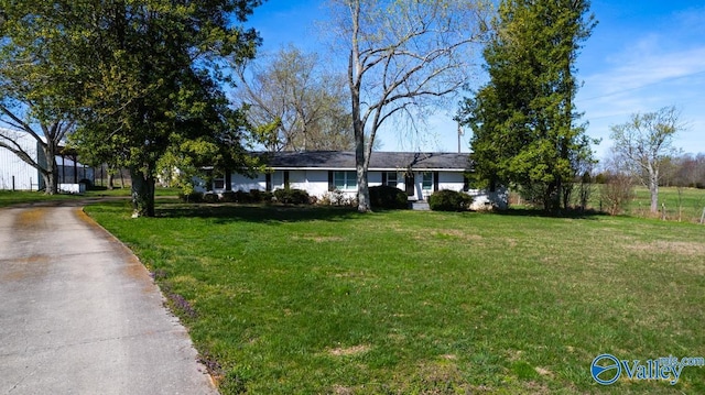 7228 Old Railroad Bed Rd, Toney, AL 35773 - ranch-style home with a front lawn and driveway
