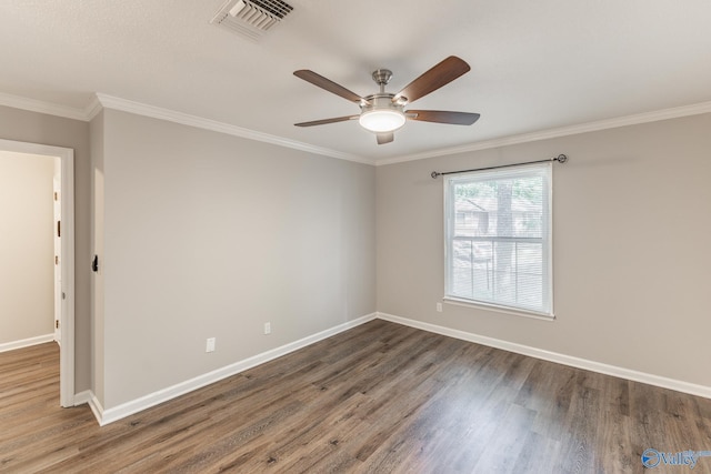2043 Woodlawn Dr SW Unit 2043, Huntsville, AL 35802 - spare room with ceiling fan, wood finished floors, and ornamental molding