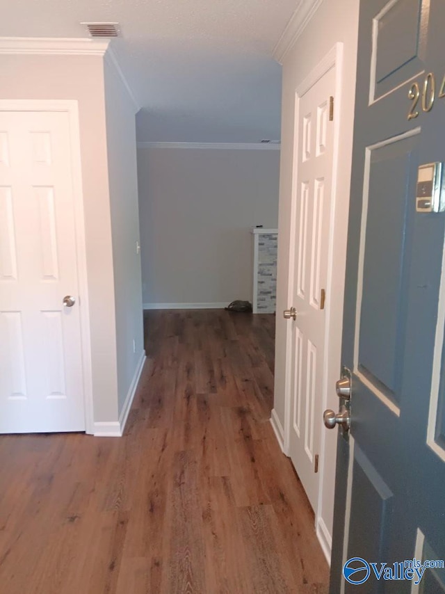 2043 Woodlawn Dr SW Unit 2043, Huntsville, AL 35802 - hall with ornamental molding and wood finished floors