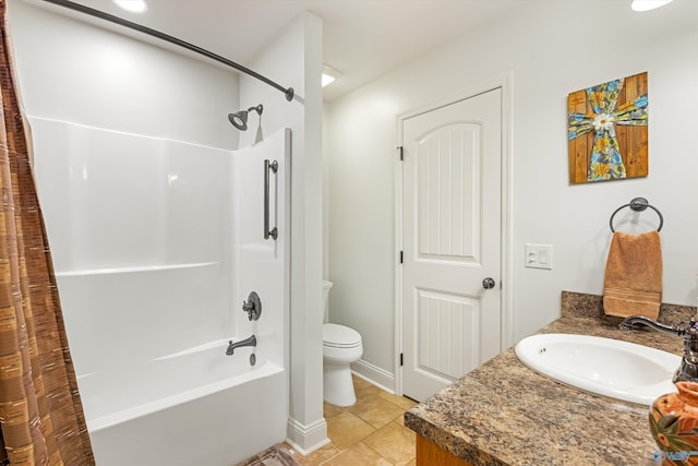 bathroom featuring tile patterned flooring, vanity, toilet, and shower / bath combo with shower curtain