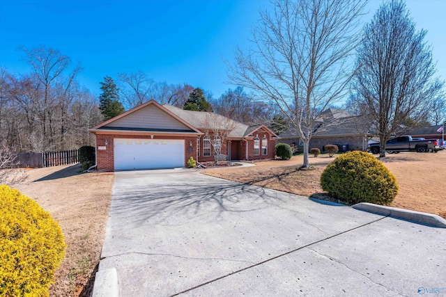 ranch-style home featuring concrete driveway, brick siding, fence, and an attached garage