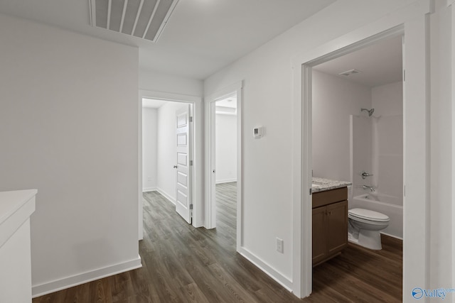 hall featuring dark hardwood / wood-style flooring