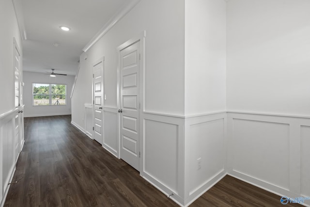 hall with crown molding and dark hardwood / wood-style floors