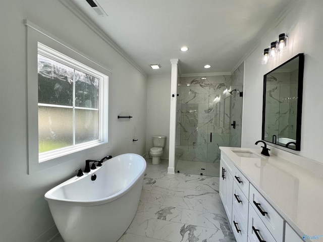 full bathroom featuring crown molding, separate shower and tub, vanity, and toilet