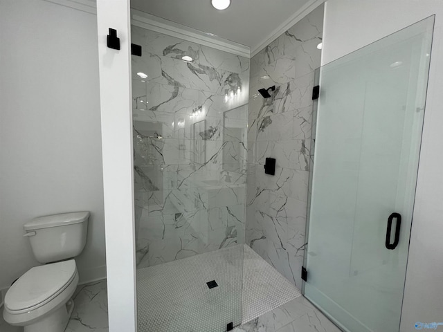 bathroom with crown molding, toilet, and an enclosed shower