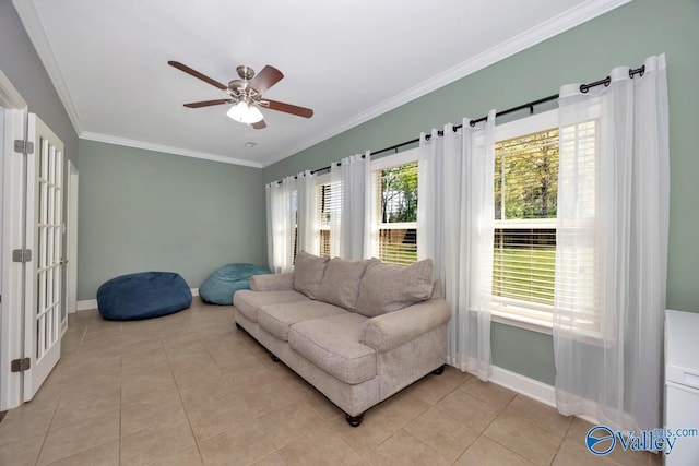 205 Maplebrook Dr, Madison, AL 35756 - living area with baseboards, light tile patterned floors, ornamental molding, and a ceiling fan