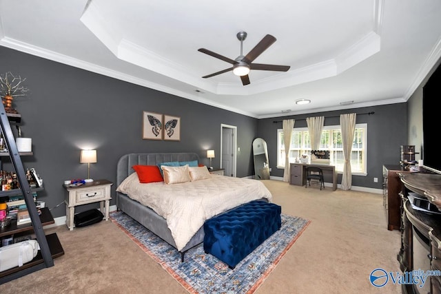 205 Maplebrook Dr, Madison, AL 35756 - carpeted bedroom featuring a tray ceiling, crown molding, baseboards, an office area, and ceiling fan