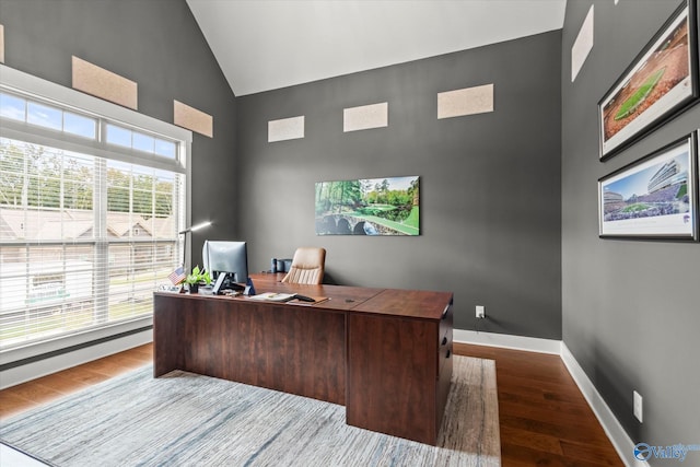 68 Natures Ridge Way, Huntsville, AL 35803 - home office featuring high vaulted ceiling, dark wood finished floors, and baseboards