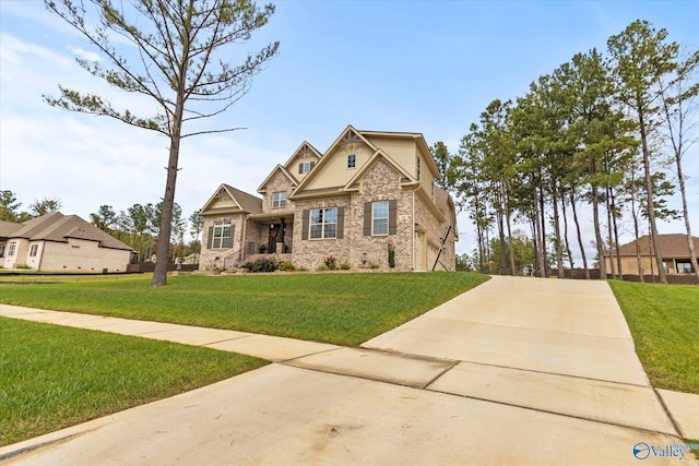 68 Natures Ridge Way, Huntsville, AL 35803 - craftsman-style house featuring concrete driveway, a front yard, and brick siding