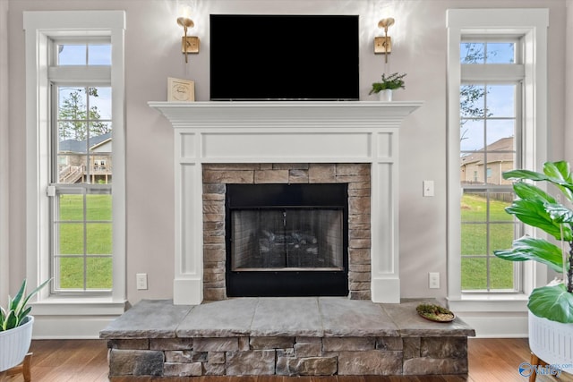 68 Natures Ridge Way, Huntsville, AL 35803 - detailed view of wood finished floors and a fireplace with raised hearth