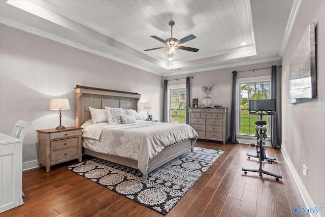 68 Natures Ridge Way, Huntsville, AL 35803 - bedroom with a tray ceiling, crown molding, hardwood / wood-style floors, multiple windows, and baseboards