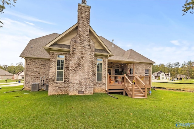 68 Natures Ridge Way, Huntsville, AL 35803 - back of property featuring brick siding, a lawn, a deck, roof with shingles, and a chimney