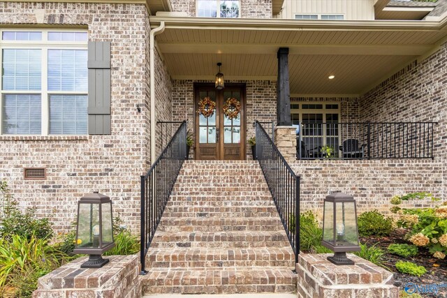 68 Natures Ridge Way, Huntsville, AL 35803 - doorway to property with french doors and brick siding