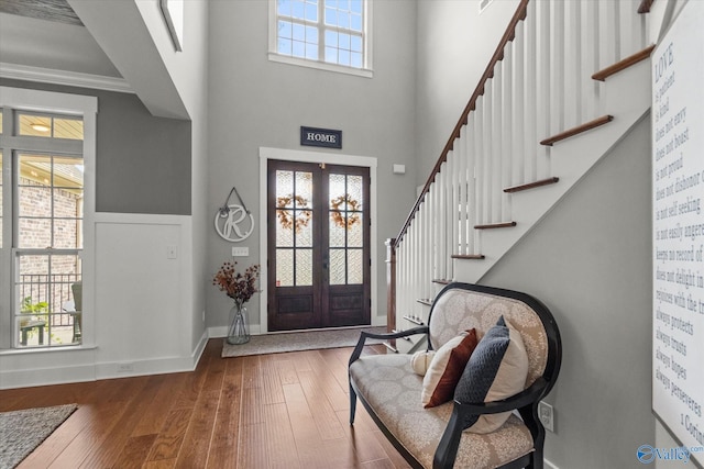 68 Natures Ridge Way, Huntsville, AL 35803 - entrance foyer featuring hardwood / wood-style flooring, french doors, baseboards, stairway, and a towering ceiling