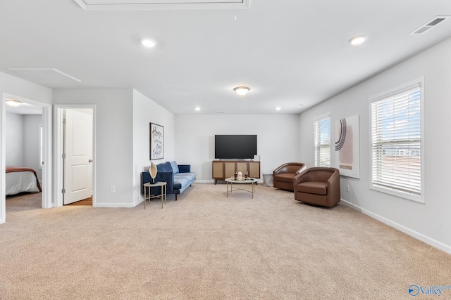 living room featuring light colored carpet