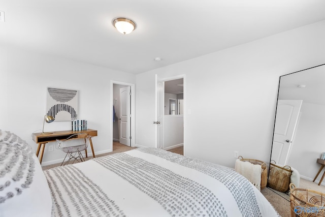 bedroom featuring light colored carpet