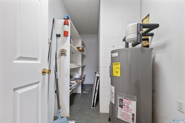 utility room with water heater