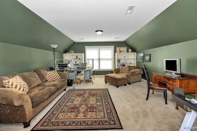 carpeted living room with lofted ceiling and a textured ceiling