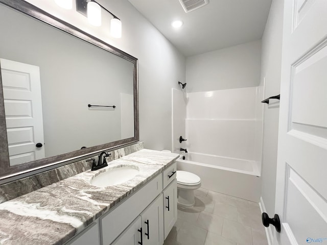 full bathroom featuring tile patterned floors, vanity, shower / bathtub combination, and toilet