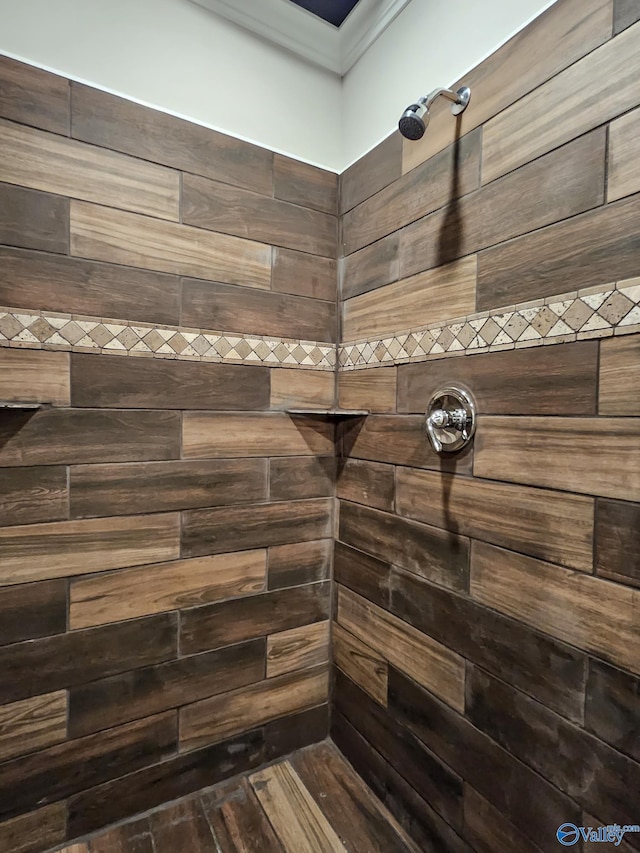 bathroom featuring a shower and wood-type flooring