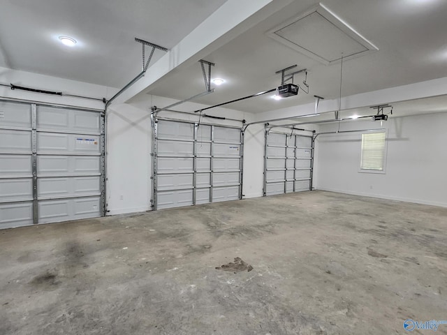 garage featuring a garage door opener