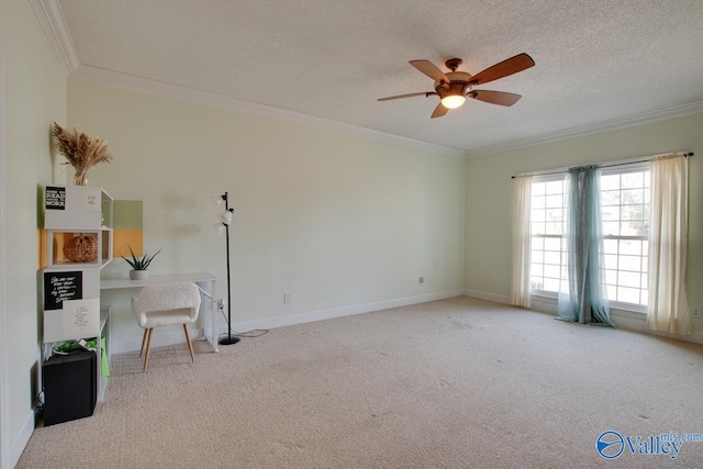 carpeted empty room with a textured ceiling, baseboards, and ornamental molding