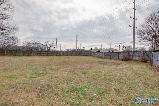 view of yard with fence