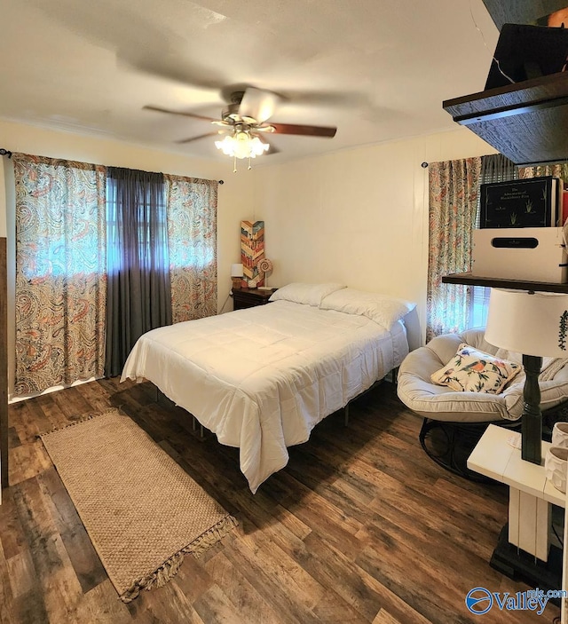 110 Circle Dr, Sand Rock, AL 35983 - bedroom with wood finished floors and ceiling fan