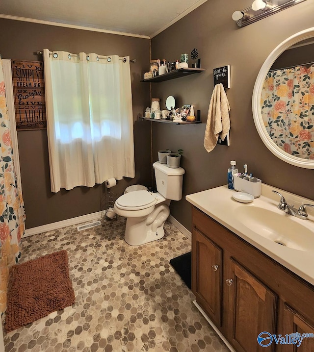 110 Circle Dr, Sand Rock, AL 35983 - full bathroom featuring baseboards, vanity, toilet, and crown molding