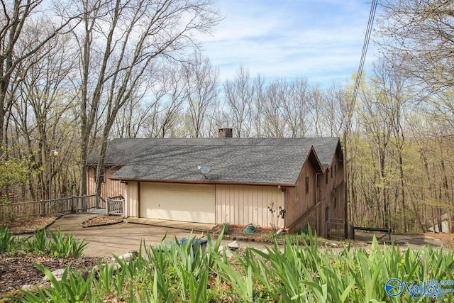 exterior space featuring a garage