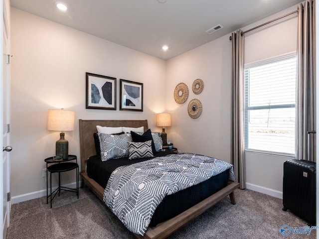 bedroom featuring visible vents, baseboards, carpet, recessed lighting, and radiator