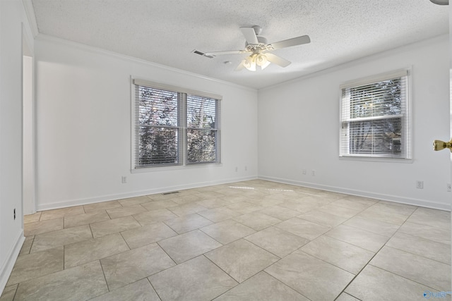 unfurnished room featuring visible vents, a textured ceiling, a ceiling fan, and crown molding