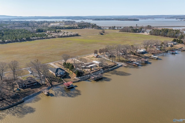 bird's eye view featuring a rural view and a water view