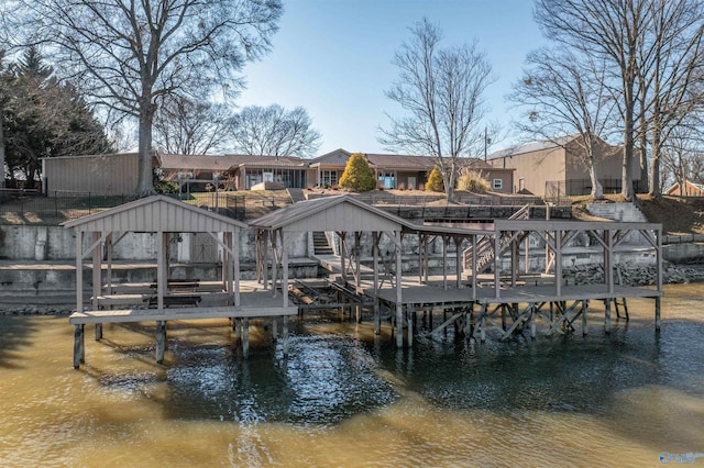 view of dock with a water view and boat lift