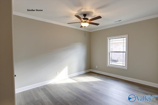 unfurnished room with ornamental molding, hardwood / wood-style floors, and ceiling fan