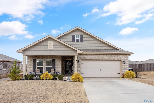 view of front of house with a garage and covered porch