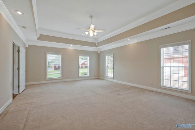 empty room with light carpet, crown molding, visible vents, and baseboards