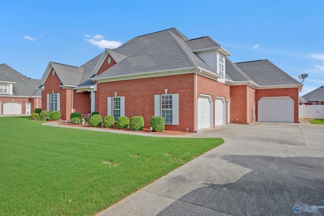 view of front of house featuring a garage, brick siding, driveway, roof with shingles, and a front yard