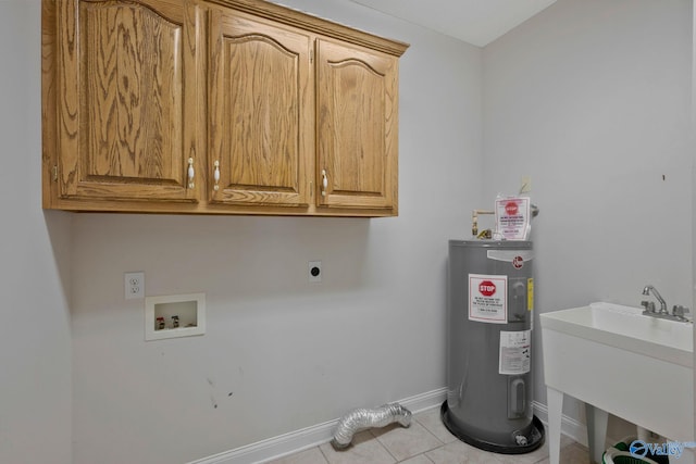 clothes washing area featuring light tile patterned floors, electric water heater, hookup for an electric dryer, washer hookup, and cabinet space