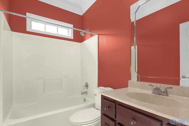 full bathroom featuring crown molding, vanity, bathtub / shower combination, and toilet