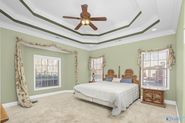 bedroom featuring ceiling fan, light colored carpet, crown molding, and multiple windows