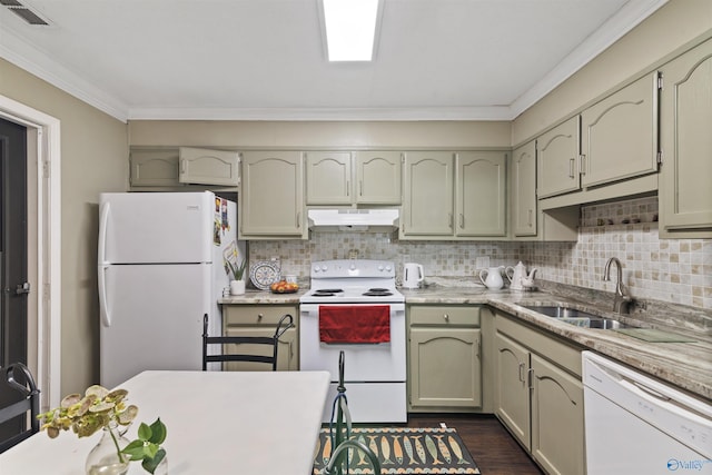 kitchen featuring tasteful backsplash, visible vents, under cabinet range hood, white appliances, and a sink