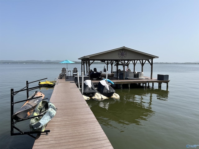 dock area with a water view